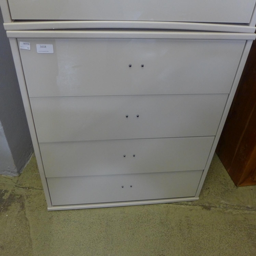 1618 - A white painted high glass four drawer chest * this lot is subject to VAT