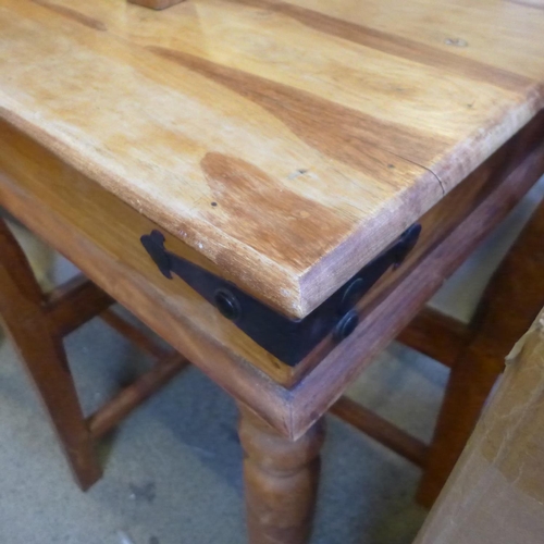 1622 - An Indian hardwood fixed top dining table with a set of six cream upholstered dining chairs