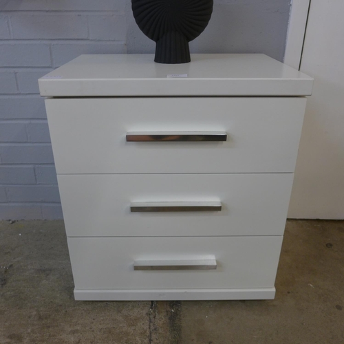 1353 - A white painted three drawer chest  * This lot is subject to vat