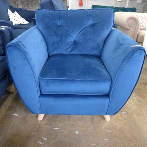 1436 - A Hoxton blue velvet armchair and ottoman footstool