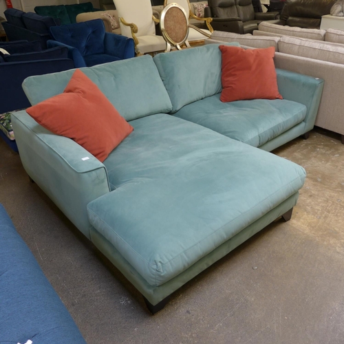 1450 - A teal velvet upholstered 4.5 seater LHF sofa/chaise with terracotta scatter cushions