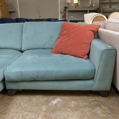 1450 - A teal velvet upholstered 4.5 seater LHF sofa/chaise with terracotta scatter cushions