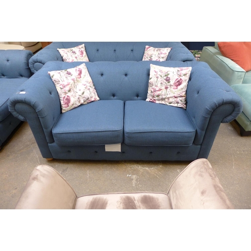 1492 - A navy blue textured weave Chesterfield style three seater sofa, two seater sofa and love seat with ... 