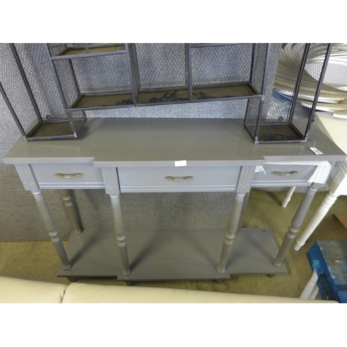 1548 - A miscellaneous lot of a white side table, silver swivel mirror, metal shelf unit and a grey three d... 