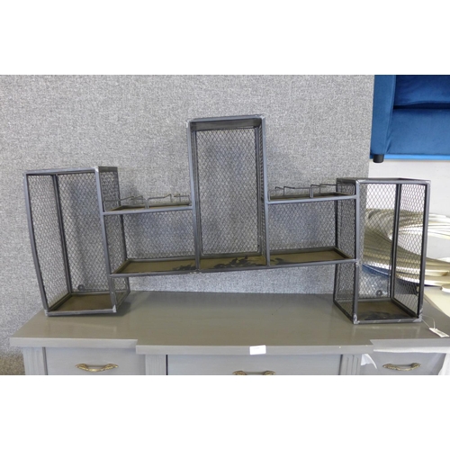 1548 - A miscellaneous lot of a white side table, silver swivel mirror, metal shelf unit and a grey three d... 