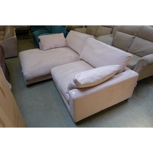 1994 - A bubblegum pink velvet four seater left hand facing sofa/chaise - marked