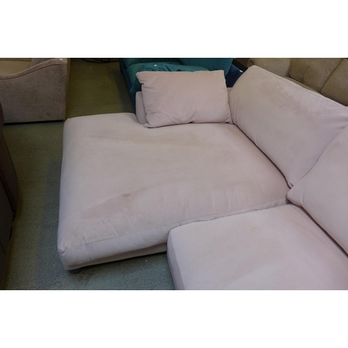 1994 - A bubblegum pink velvet four seater left hand facing sofa/chaise - marked