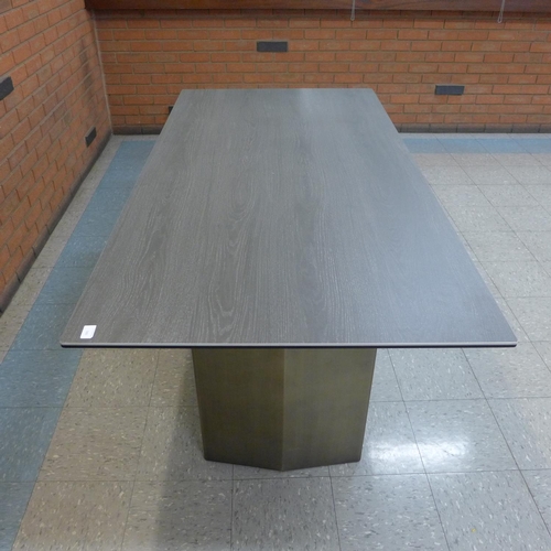 1301 - A grey ceramic topped dining table