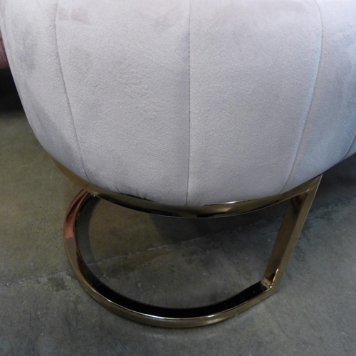 1330 - A pink upholstered footstool with gold legs