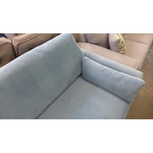 1471 - A light blue velvet upholstered four seater sofa