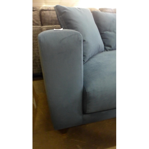 1503 - A blue velvet upholstered scatter back 4.5 seater sofa