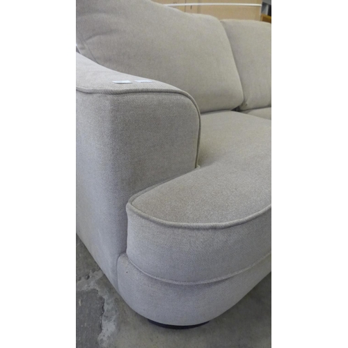 1505 - A sandstone upholstered RHF five seater corner sofa/chaise