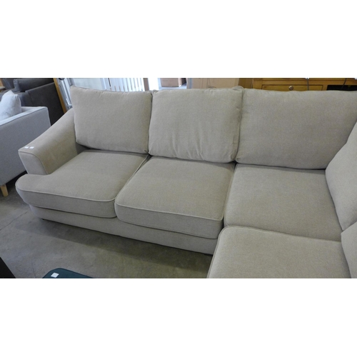 1505 - A sandstone upholstered RHF five seater corner sofa/chaise