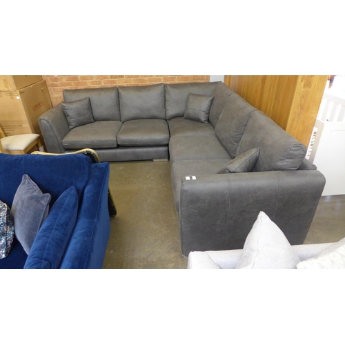 1509 - A grey vegan leather five seater corner sofa