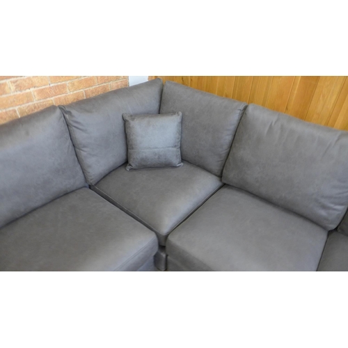 1509 - A grey vegan leather five seater corner sofa