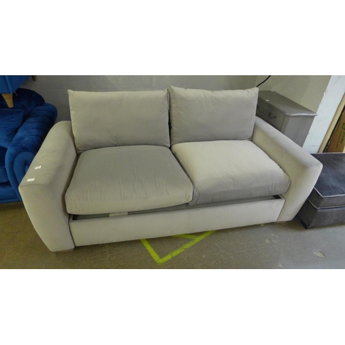 1518 - A light grey velvet upholstered modular three seater sofa