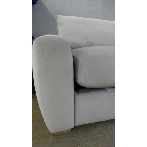 1518 - A light grey velvet upholstered modular three seater sofa