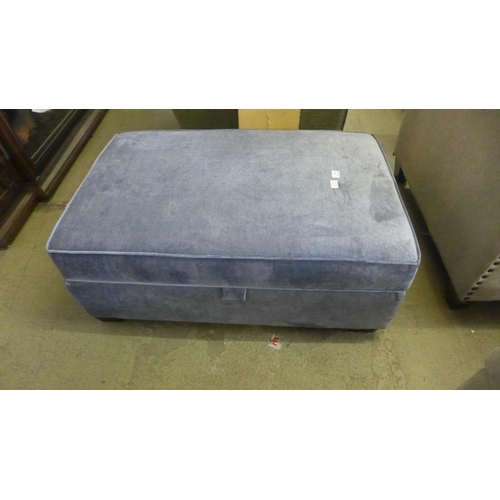 1556 - A blue upholstered ottoman footstool