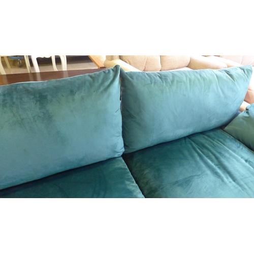 1575 - A teal and dark blue velvet four seater sofa