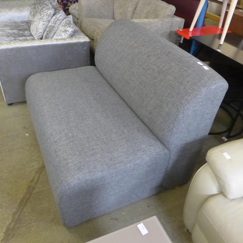 1590 - A grey textured two seater sofa without arms