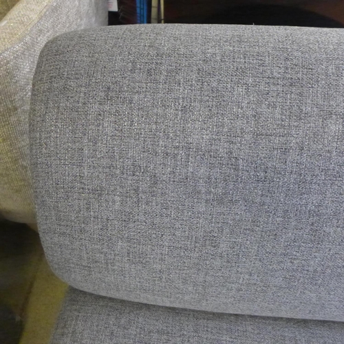 1590 - A grey textured two seater sofa without arms