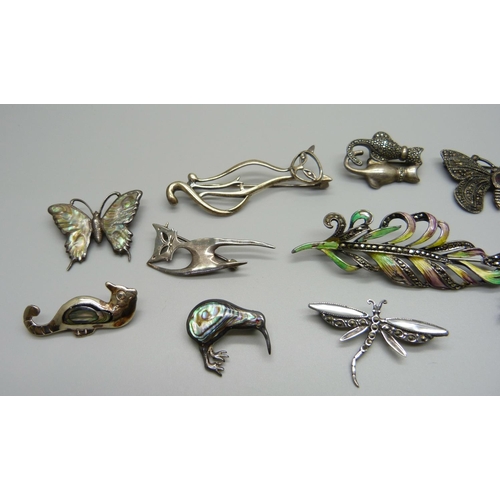 1006 - Ten silver brooches including cats and butterflies