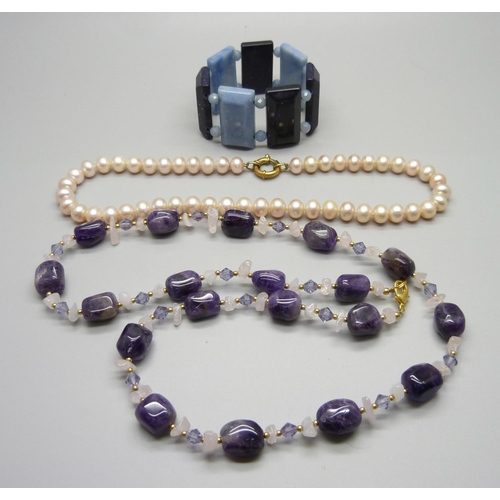 1019 - Silver mounted pearls, an amethyst necklace and a bracelet