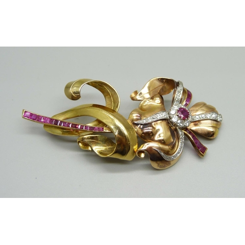 1019A - A large yellow metal floral brooch set with rubies and diamonds, 31g, 88mm