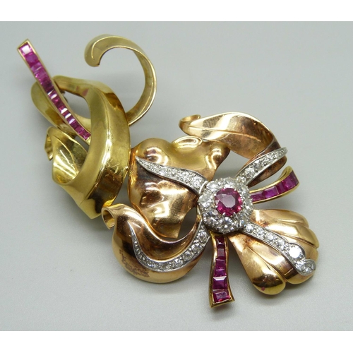 1019A - A large yellow metal floral brooch set with rubies and diamonds, 31g, 88mm