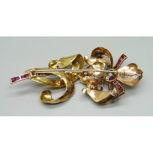 1019A - A large yellow metal floral brooch set with rubies and diamonds, 31g, 88mm