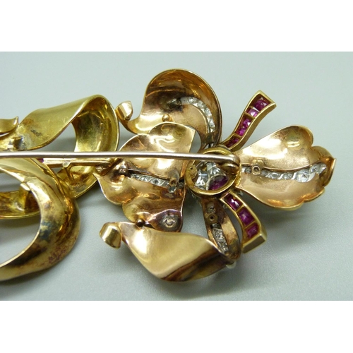 1019A - A large yellow metal floral brooch set with rubies and diamonds, 31g, 88mm