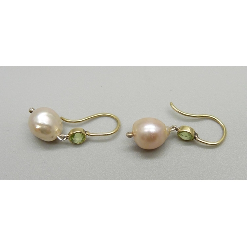 1048 - A cased pair of peridot and cultured pearl drop earrings, (pearls mounted in silver)