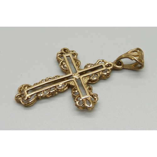 1053 - A 9ct gold cross pendant, 4.8g