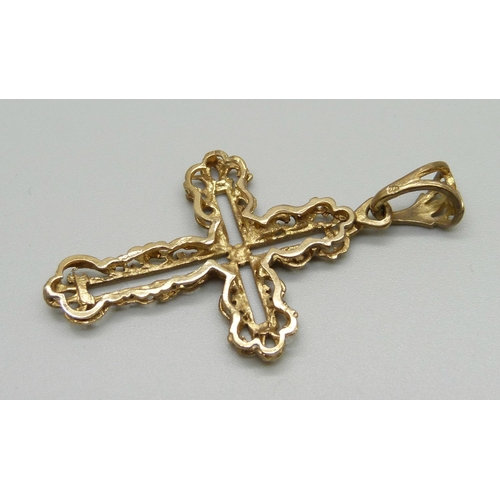 1053 - A 9ct gold cross pendant, 4.8g