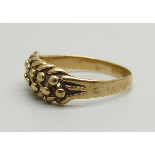 1054 - A 9ct gold Keeper ring, 2.9g, R