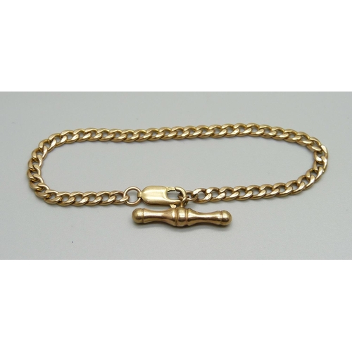 1057 - A 9ct gold curb bracelet with T bar, 4.6g