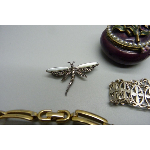 1064 - A silver bracelet and brooch, costume jewellery and a pill box