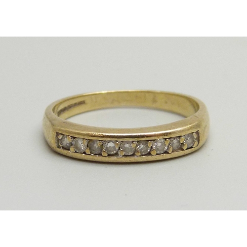 1084 - A 9ct gold and nine stone diamond set ring, 2g, L