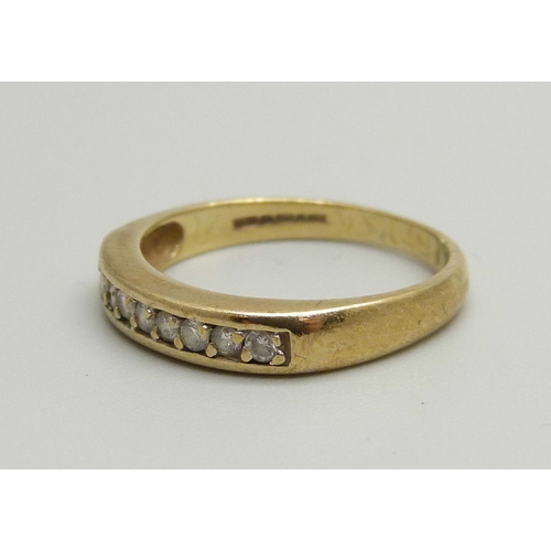 1084 - A 9ct gold and nine stone diamond set ring, 2g, L