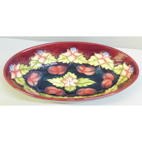 603 - A Moorcroft morello cherry dish by Rachael Bishop, limited edition no. 762, 23.5cm