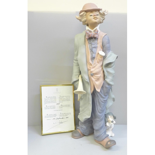 616 - A large Lladro figure of a clown, Mischievous Musician, limited edition 249/350, 46cm