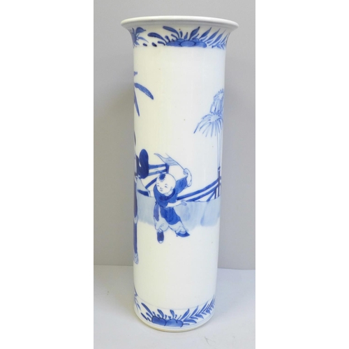 617 - A Chinese blue and white cylindrical vase with flared rim, decorated with figures, with 19th Century... 