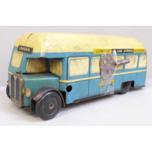 622 - A Chad Valley tin plate clockwork toy bus, 15cm