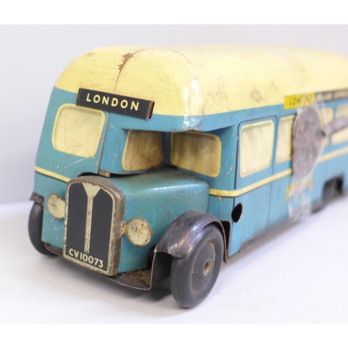 622 - A Chad Valley tin plate clockwork toy bus, 15cm