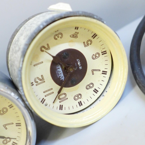 628 - Three small Jaeger car clocks, one with loose bezel