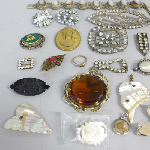 635 - Vintage costume jewellery; jet, a lava cameo brooch, a silver and stone set claw brooch, paste set b... 