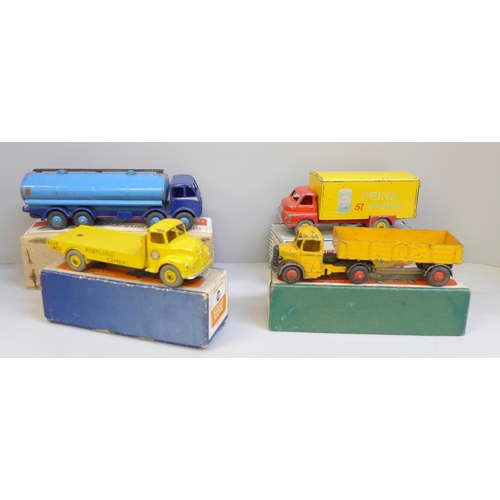 644 - Four Dinky Supertoys die-cast model vehicles comprising 533, 521, 923 and 504