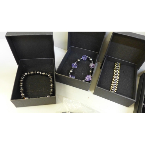 652 - A collection of hematite jewellery, four necklaces and four bracelets