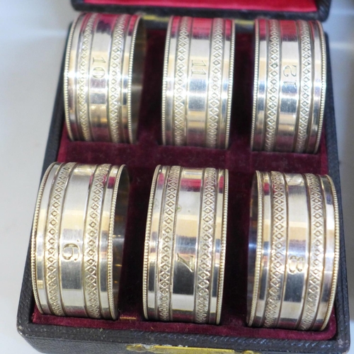 661 - Two sets of six napkin rings, boxed