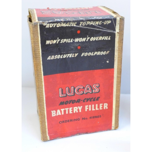 668 - A Mobil oil can and a Lucas motor-cycle battery filler, in original box